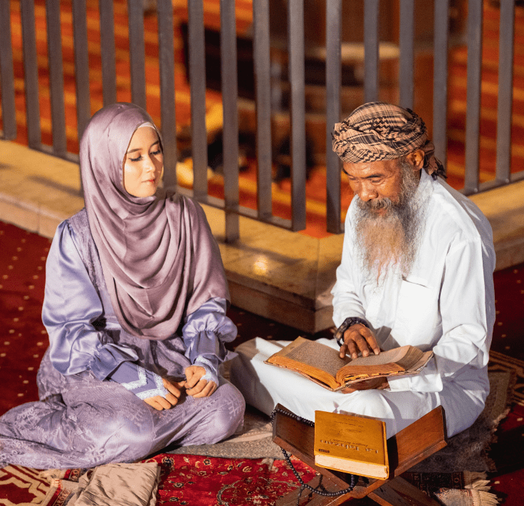 Mujer recitando la Shahada junto a un imam